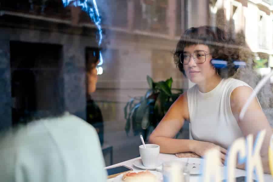 People sharing a quiet moment together in an everyday setting.